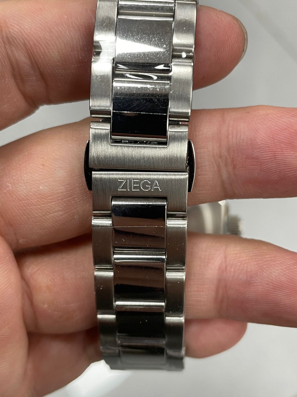 Mens chronograph watch with a black dial